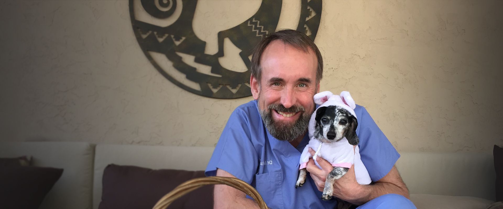 doctor ian kupkee with grendel his dachshund dog
